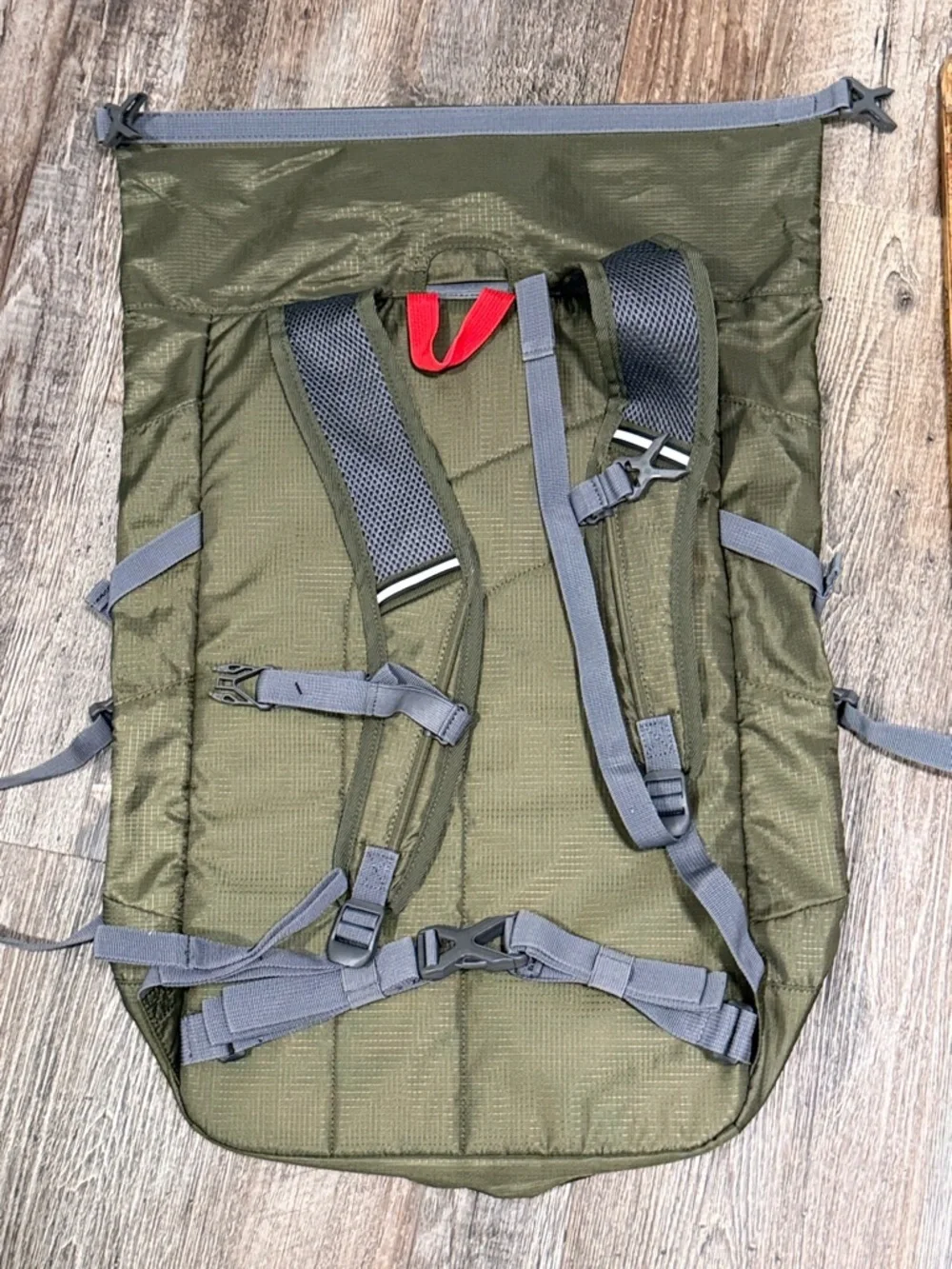 Outdoor Products green roll-top camping backpack
